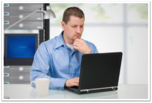Man looking at a computer